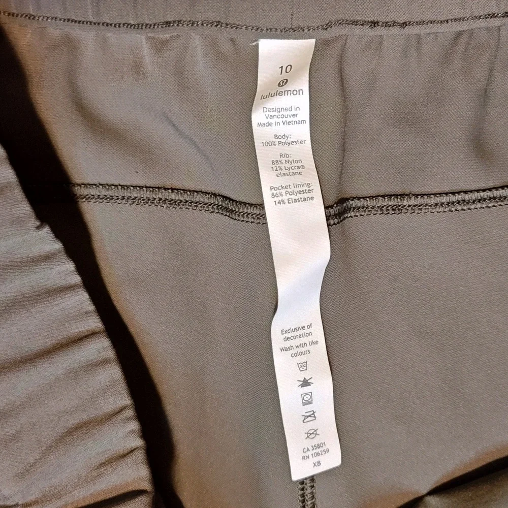 Lululemon On the Fly Jogger Women 10 Green Woven Tapered Pant Drawstring Pocket